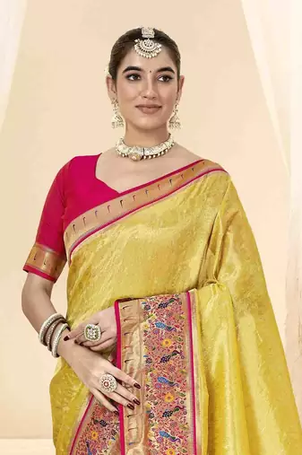 Yellow tissue silk blend saree with unstitched tissue blouse piece