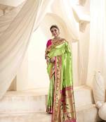 Parrot green tissue silk blend saree with unstitched tissue blouse piece