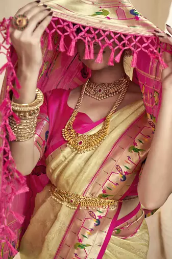 Beige tissue silk blend saree with unstitched tissue blouse piece