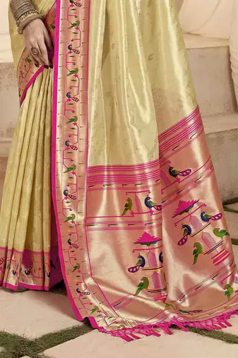 Beige tissue silk blend saree with unstitched tissue blouse piece