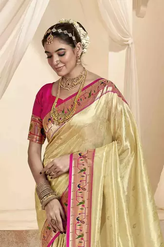 Beige tissue silk blend saree with unstitched tissue blouse piece