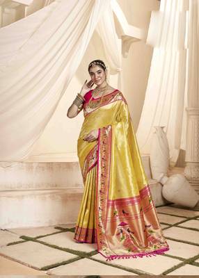 Yellow tissue silk blend saree with unstitched tissue blouse piece 1