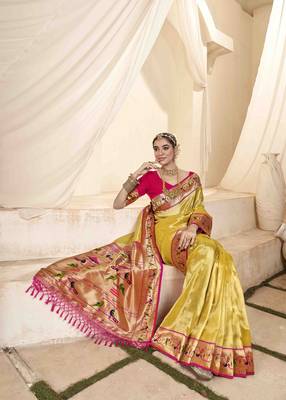 Yellow tissue silk blend saree with unstitched tissue blouse piece 2
