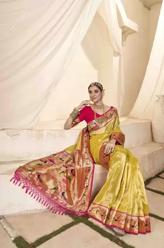 Yellow tissue silk blend saree with unstitched tissue blouse piece