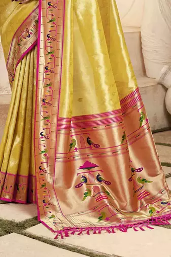 Yellow tissue silk blend saree with unstitched tissue blouse piece