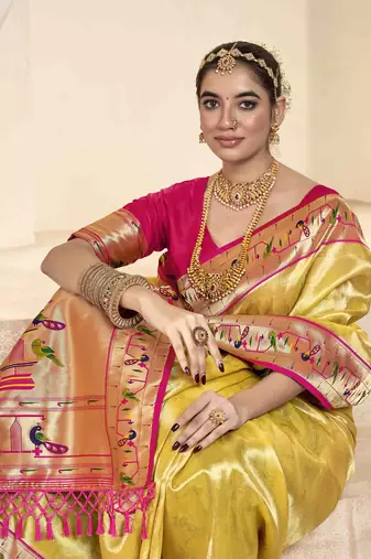 Yellow tissue silk blend saree with unstitched tissue blouse piece