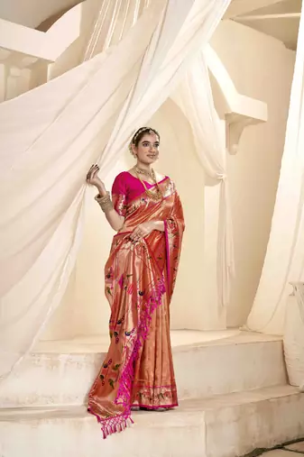 Rust tissue silk blend saree with unstitched tissue blouse piece