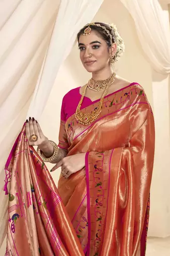 Rust tissue silk blend saree with unstitched tissue blouse piece