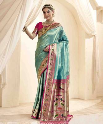 Turquoise tissue silk blend saree with unstitched tissue blouse piece 1