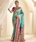 Turquoise tissue silk blend saree with unstitched tissue blouse piece