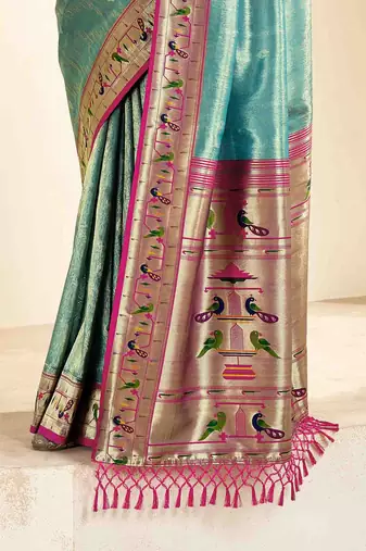 Turquoise tissue silk blend saree with unstitched tissue blouse piece