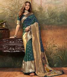 Dark green silk blend saree with unstitched blouse piece
