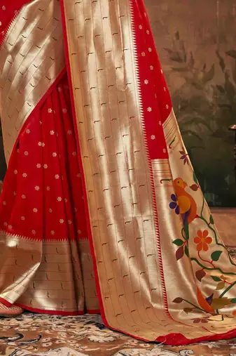 Red silk blend saree with unstitched blouse piece