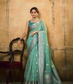 Turquoise tissue silk blend saree with unstitched tissue blouse piece