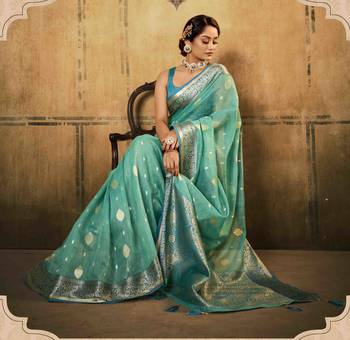 Turquoise tissue silk blend saree with unstitched tissue blouse piece 2