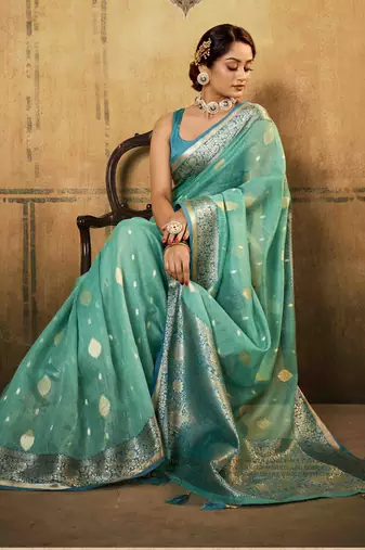Turquoise tissue silk blend saree with unstitched tissue blouse piece