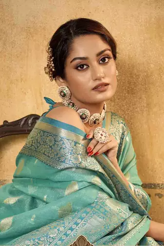 Turquoise tissue silk blend saree with unstitched tissue blouse piece