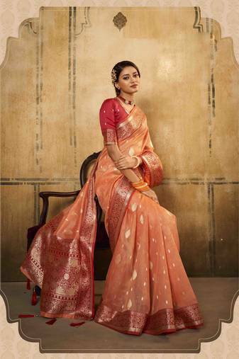 Peach tissue silk blend saree with unstitched tissue blouse piece