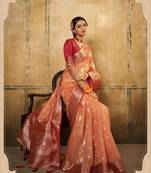Peach tissue silk blend saree with unstitched tissue blouse piece