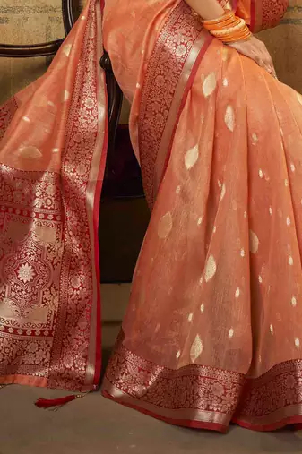 Peach tissue silk blend saree with unstitched tissue blouse piece