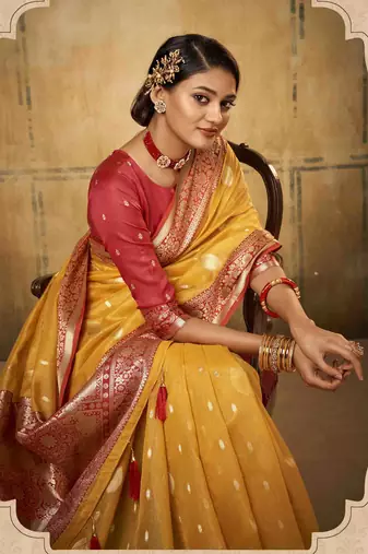 Yellow tissue silk blend saree with unstitched tissue blouse piece