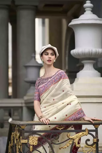 Cream linen cotton saree with unstitched linen cotton blouse piece