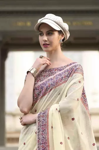 Cream linen cotton saree with unstitched linen cotton blouse piece