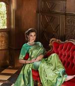 Parrot green silk blend saree with unstitched blouse piece
