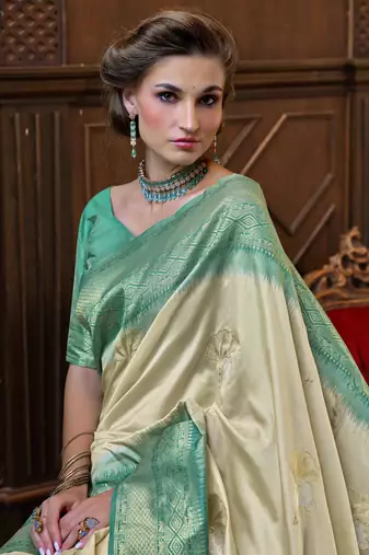 Beige silk blend saree with unstitched blouse piece