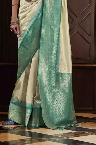 Beige silk blend saree with unstitched blouse piece