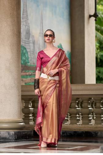 Rust tissue silk blend saree with unstitched tissue blouse piece
