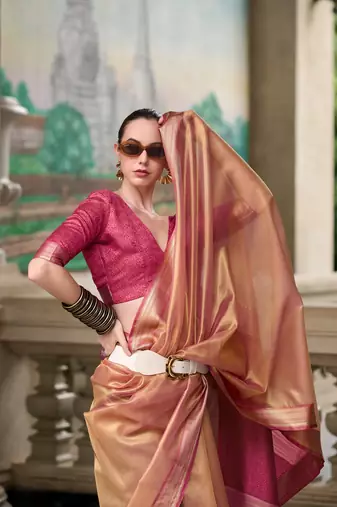 Rust tissue silk blend saree with unstitched tissue blouse piece