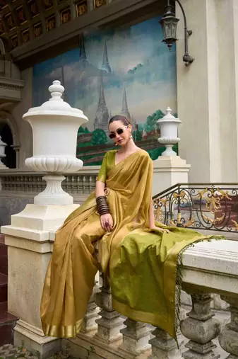 Mustard tissue silk blend saree with unstitched tissue blouse piece