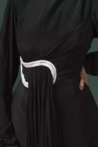 Black draped gown with pearl and crystal motif