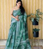 Green woven linen saree with blouse piece