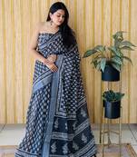Black woven linen saree with blouse piece
