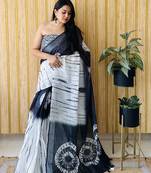 Black woven linen saree with blouse piece