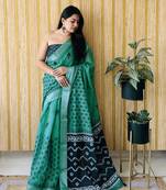 Green woven linen saree with blouse piece