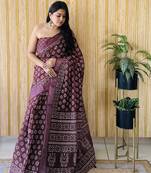 Maroon woven linen saree with blouse piece