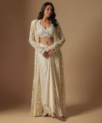 Moon pie full embroidered blouse paired with drape skirt and emb full jacket 1