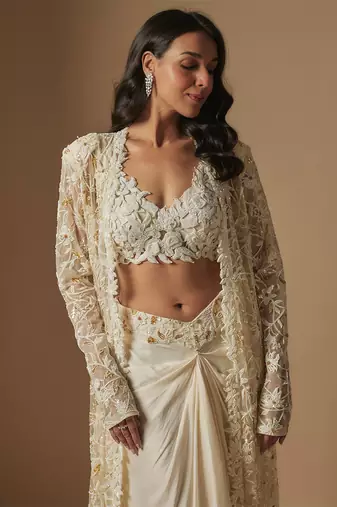 Moon pie full embroidered blouse paired with drape skirt and emb full jacket