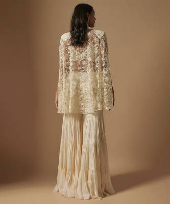 Orlique mirror work blouse paired with embroidered cape and sharara 4