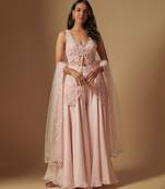 Noom hand embroidered short kurti paired with sharara and dupatta