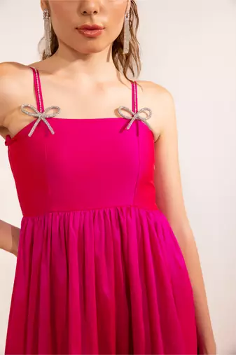 Fuschia pink with rhinestone bow flared maxi dress