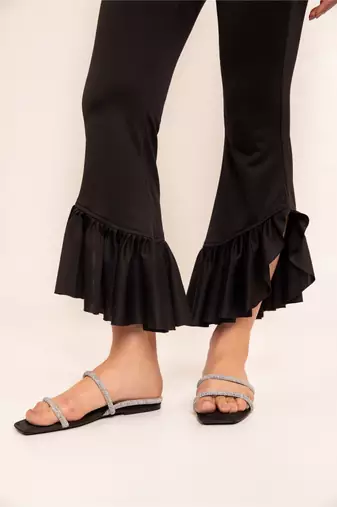 Black beauty ruffled hem high waisted pants