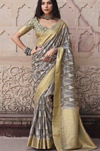 Beige silk blend saree with unstitched blouse piece