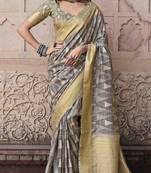 Beige silk blend saree with unstitched blouse piece