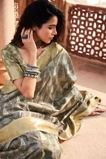 Beige silk blend saree with unstitched blouse piece