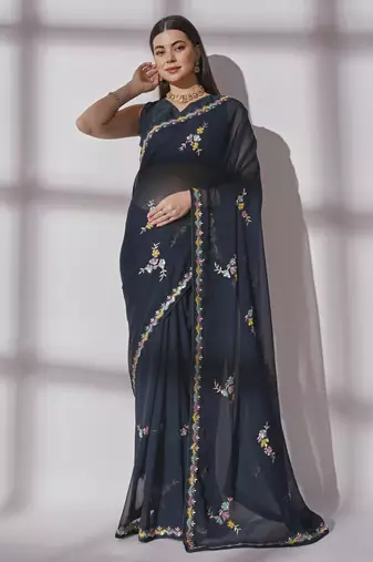 Varni fabrics women teal  georgette  saree comes with matching blouse