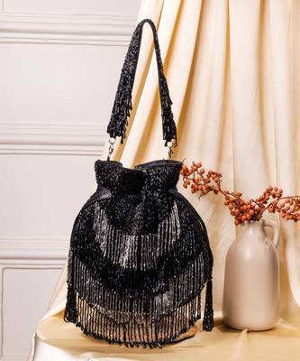 Black raw silk hand embroidered potli bag 1